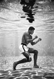 poster for “FLOAT LIKE A BUTTERFLY Photographs of Muhammad Ali by Flip Schulke 1961-1964” Exhibition