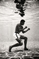 poster for Flip Schulke “Ali: Underwater”  