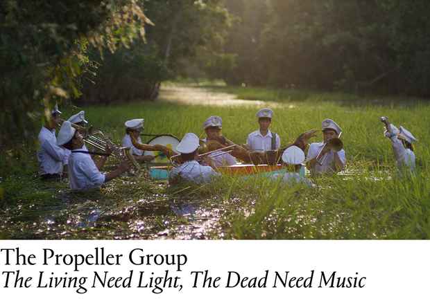 poster for The Propeller Group “The Living Need Light, The Dead Need Music”