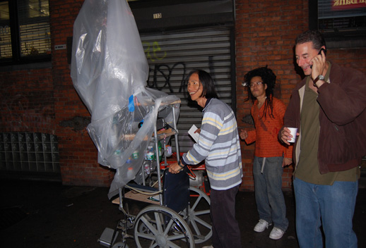Chin Chih Yang roaming the streets projecting a blue seascape filled with jellyfish. This piece also curiously featured an air raid siren which the neighbors surely love. Photo © 2008 Matt Schlecht.