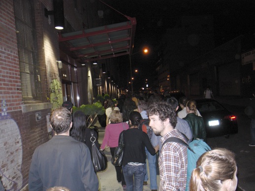 It felt oddly funny and surreal to be part of the big tour of people, about 100, walking around Friday night Williamsburg searching for street art. Photo © 2008 Kosuke Fujitaka.